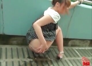 Outdoors shitting and feces showing with a girl